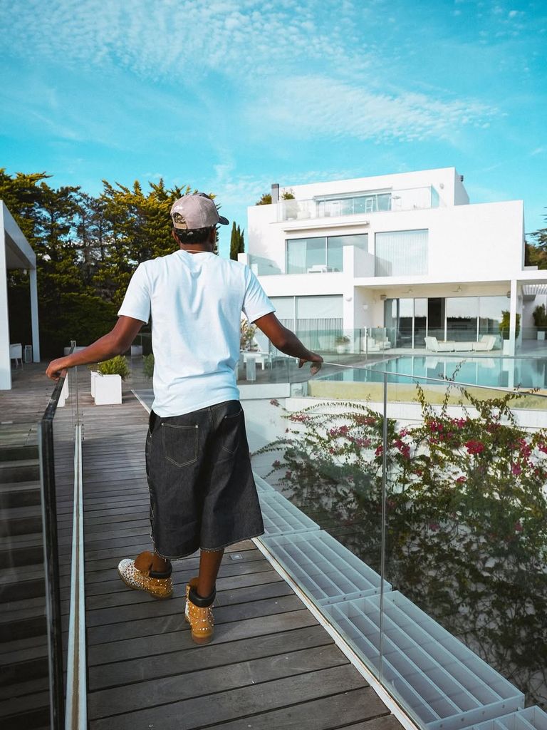 Lamine Yamal looking over the pool at his mansion in Esplugues de Llobregat