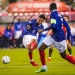 Michael Olise shoots for France against Belgium