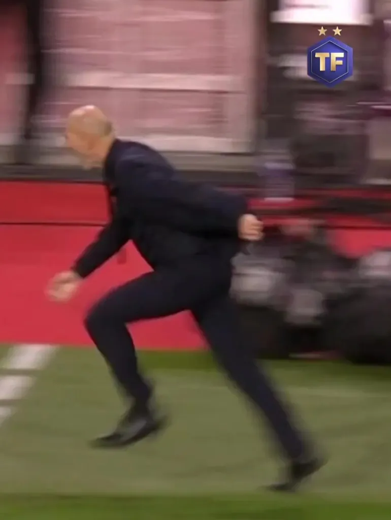 Zinedine Zidane celebrates Michael Olise's winner for France