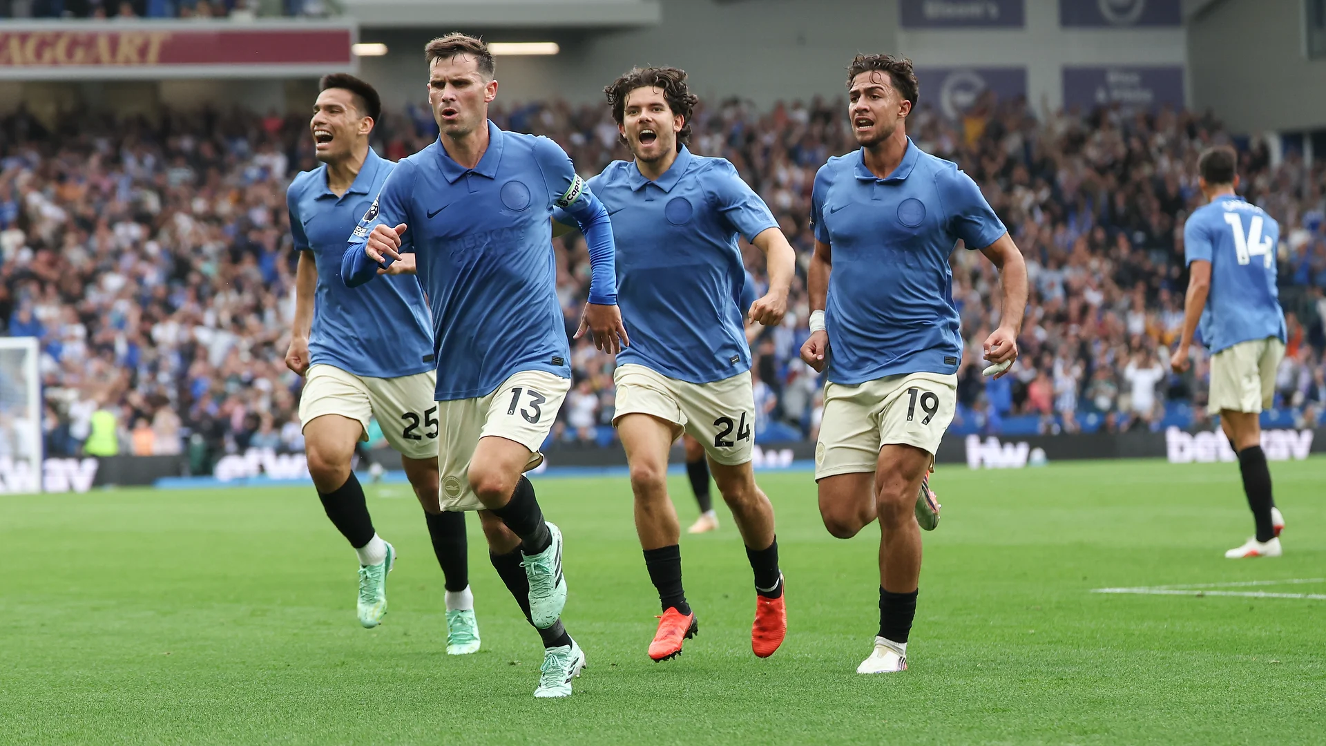 Brighton players celebrate during the Premier League victory over Arsenal