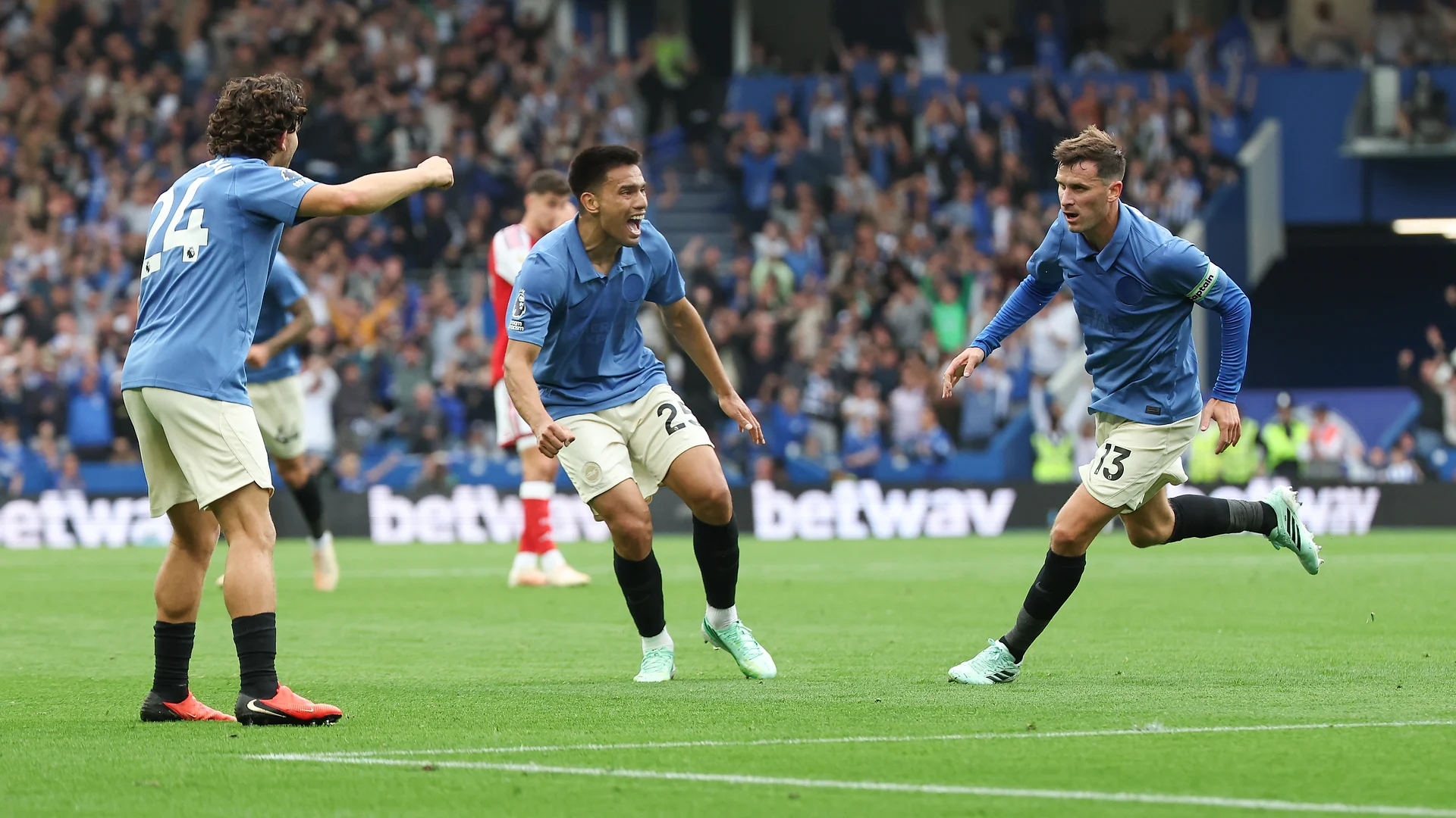 Brighton players celebrate a goal in the 3-0 win over Arsenal