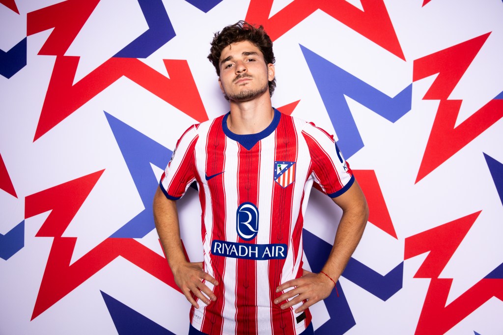 Julian Alvarez poses in Atletico Madrid's home kit during the 2026-27 season