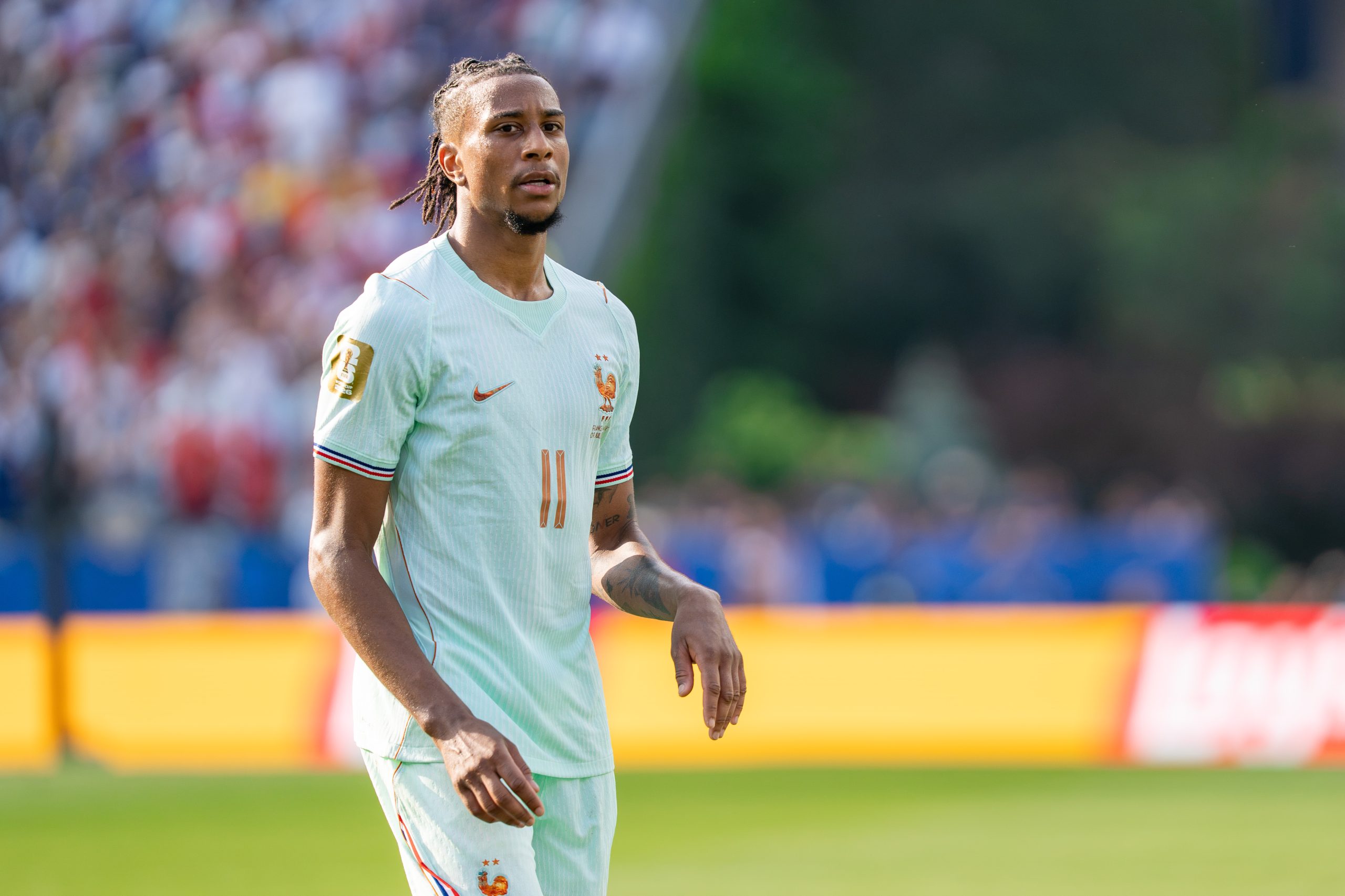 Michael Olise in action for France in 2026