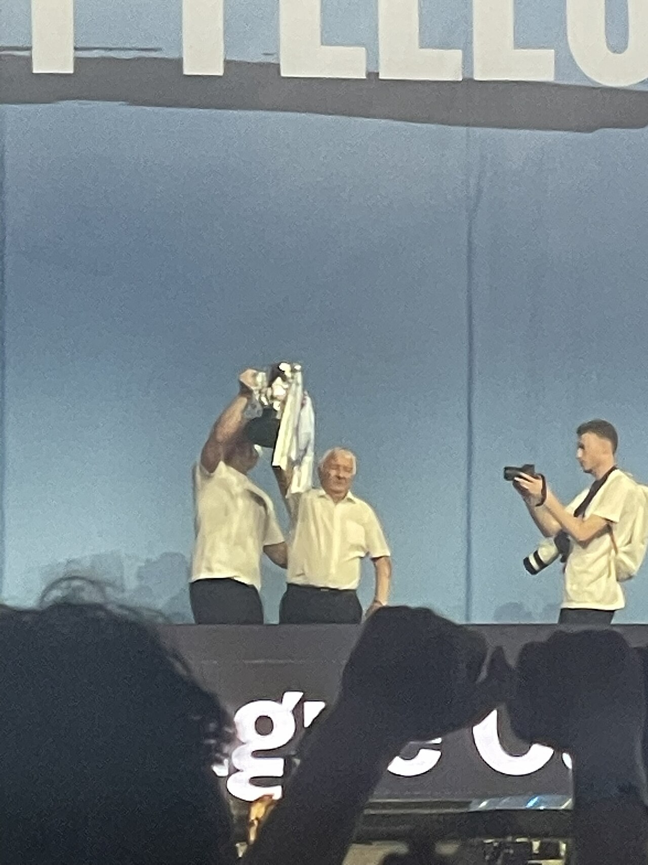 Mike Summerbee holding a Manchester City trophy in 2026